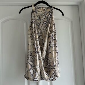 Blue and cream snakeskin top! Never worn!